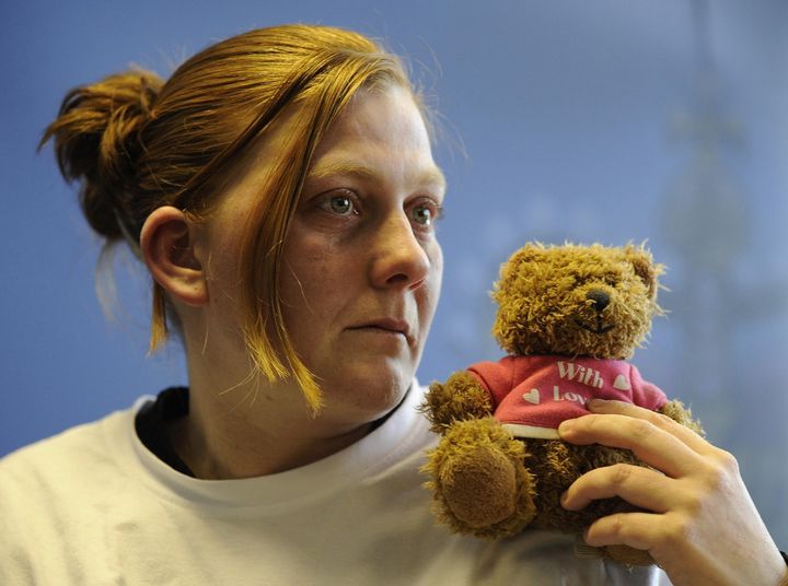 Karen Matthews holding her daughter's favourite teddy bear as she makes an emotional appeal for her safe return in March, 2008