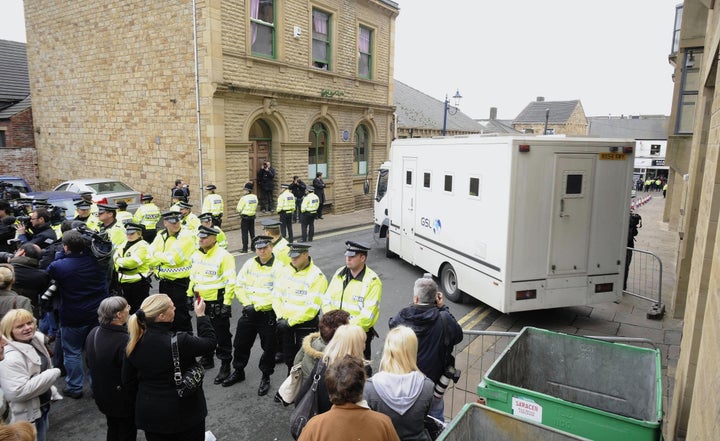 A van leaves Dewsbury Magistrates Court in 2008 after Karen Matthews was remanded in custody for repeatedly concealing information about the whereabouts of her daughter