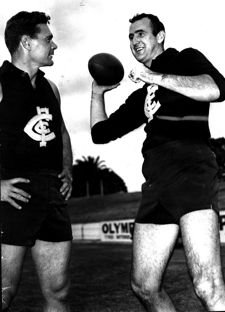 A February 1966 photo of Colin Ridgway showing Carlton coach Ron Barassi how to play football the American way in Melbourne, Victoria.