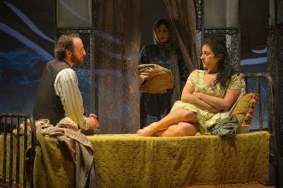 Rasheed (Haysam Kadri) and Laila (Nadine Malouf) in a scene from <strong><em>A Thousand Splendid Suns</em></strong>
