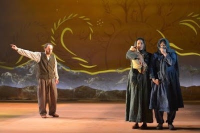 Haysam Kadri (Rasheed), Nadine Malouf (Laila) and Kate Rigg (Mariam) in a scene from <strong><em>A Thousand Splendid Suns</em