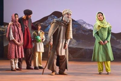 Talib (Haysam Kadri) shows Azizah, Tariq, Kalmai, and Laila where Mariam grew up in a scene from <strong><em>A Thousand Splen