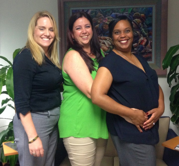 Amber, Kristine and Lauren all smile for the camera, in a good mood after an evening of socializing — and deep talks — about reintegration for women veterans. 