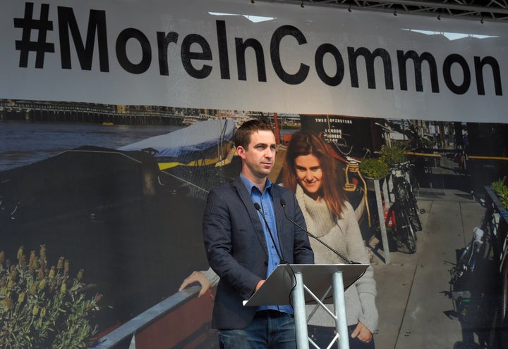<strong>Brendan Cox, the husband of murdered Labour Party MP Jo Cox,(pictured behind him) speaks during a special service at Trafalgar Square in London in June</strong>