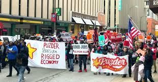 <p> Fast food workers march against Puzder in St. Louis, Missouri. </p>