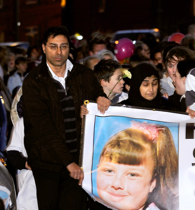 Local Labour councillor Mumtaz Hussain pictured holding a banner in the search for Shannon. He said nobody was involved in the search for publicity