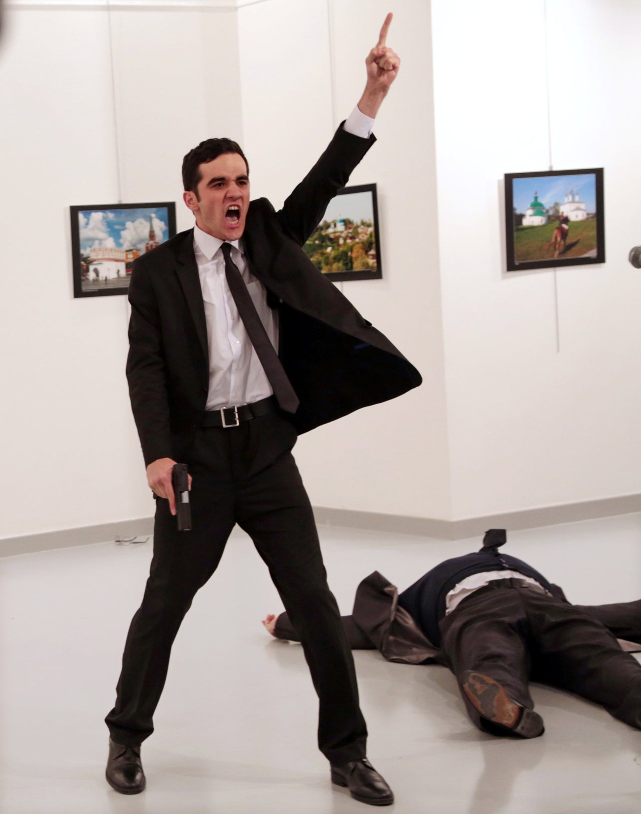 Mevlut Mert Altintas shouts after shooting Andrei Karlov, right, the Russian ambassador to Turkey, at an art gallery in Ankara, Turkey, Monday, Dec. 19, 2016. This image won World Press Photo Of The Year. 