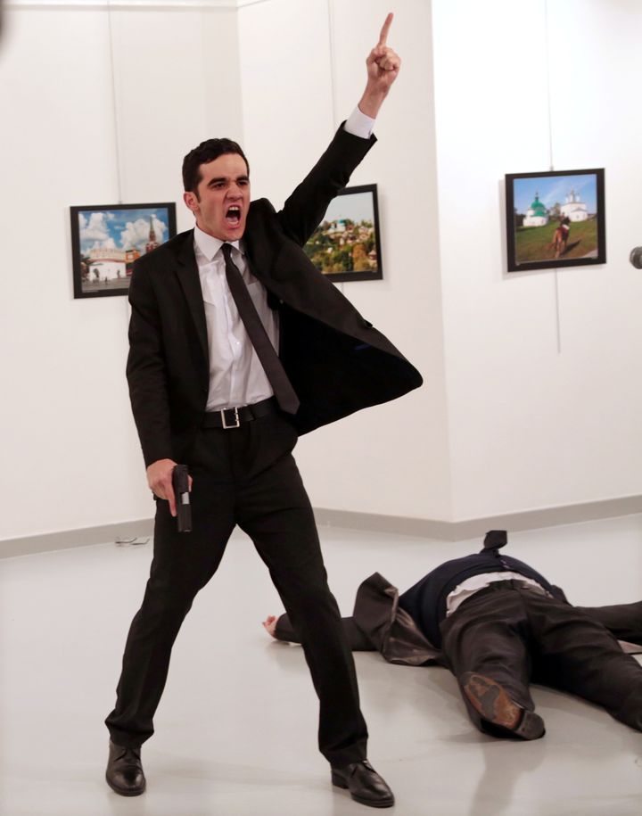 Mevlut Mert Altintas shouts after shooting Andrei Karlov, right, the Russian ambassador to Turkey, at an art gallery in Ankara, Turkey, Monday, Dec. 19, 2016. This image won World Press Photo Of The Year. 