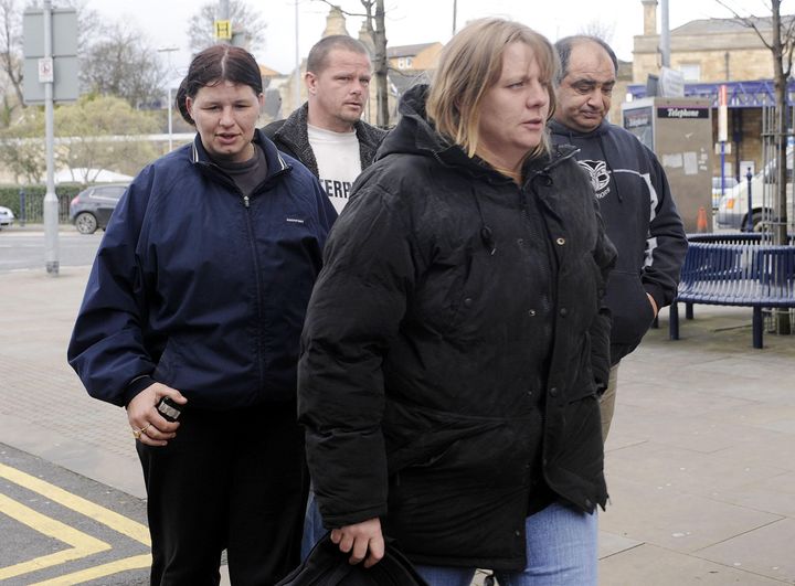 Julie Bushby (front), friend of Karen Matthews, outside Dewsbury Magistrates Court eight years ago