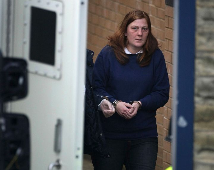 A handcuffed Karen Matthews, the mother of Shannon Matthews, leaves Dewsbury Police Station today to appear at court charged with perverting the course of justice and child neglect on April 9, 2008