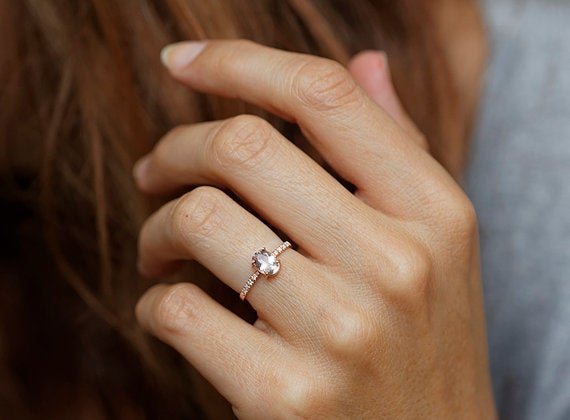 Simple delicate engagement top rings