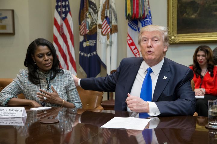 White House communications official Omarosa Manigault, left, a former contestant on "The Apprentice," attends an African-American History Month listening session with Trump on Feb. 1.