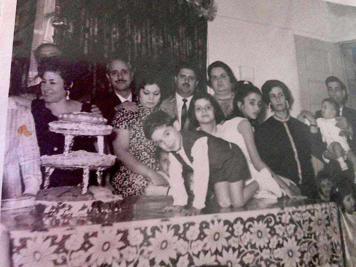 Me on the table at my two-year-old birthday party in Damascus - Syria.