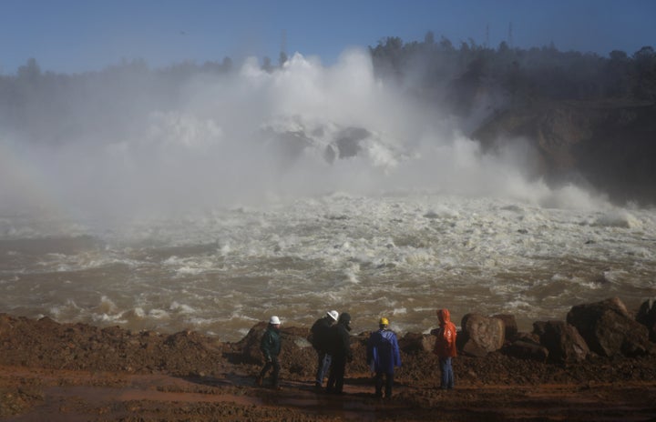Water is released from the Lake Oroville Dam after an evacuation was ordered for communities downstream from the dam in Orovi