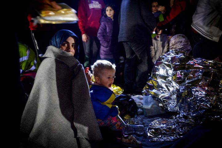 Migrants arrive in Mytilene, on the Greek island of Lesbos, on March 19, 2016. 