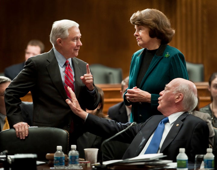 Then-Sen. Jeff Sessions with Democratic Sens. Dianne Feinstein and Patrick Leahy. Sessions told Feinstein and Leahy during confirmation that he did not believe he would need to recuse himself from cases involving Trump or his associates.