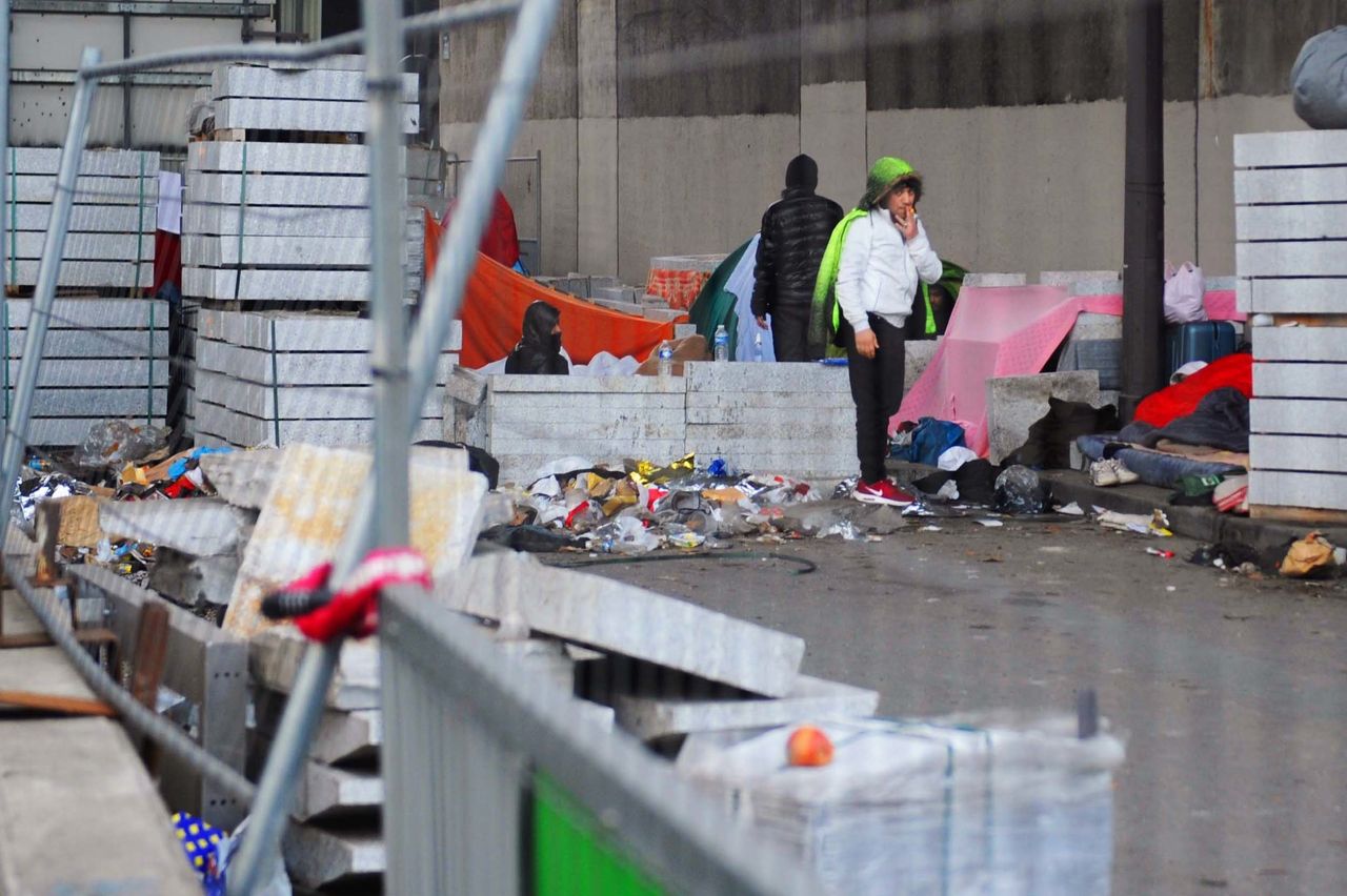 This encampment, beneath a highway in Paris, France, is home to about 60 people, volunteers say.