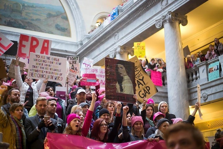 Demonstrators flooded the state Capitol in Salt Lake City on Jan. 23, the first day of Utah's legislative session, to defend women's rights.