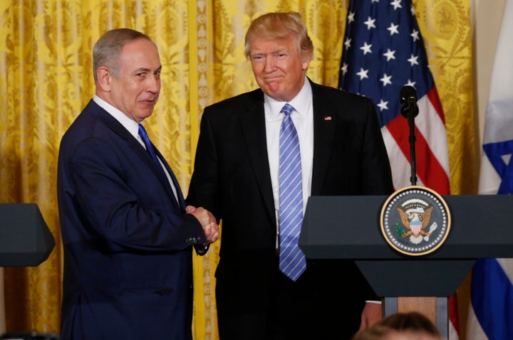 President Donald Trump greets Israeli Prime Minister Benjamin Netanyahu after a joint news conference at the White House on Feb. 15, 2017.