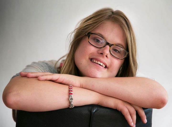 A young strong woman who has Downsyndrome