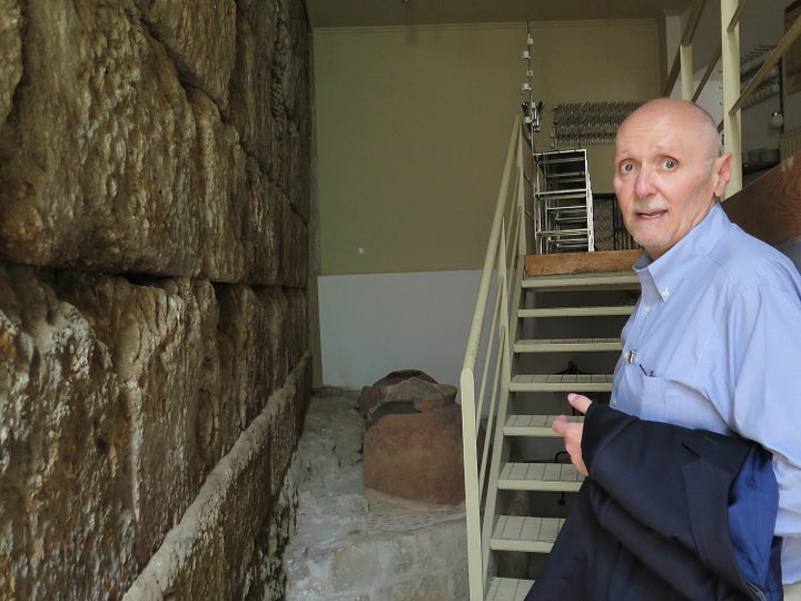 Athens with a Native guide Constantine E. Cavoulacos, an architect, takes me into the Architects Club to see a stone wall that dates to Pericles. 