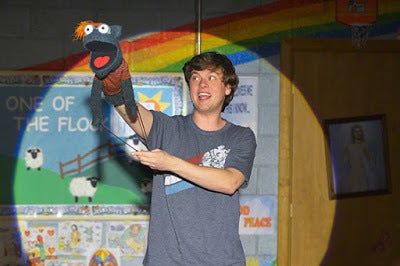 Jason (Michael Doherty) and his puppet, Tyrone, in a scene from <strong><em>Hand to God</em></strong>