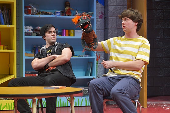Timothy (Michael McIntire) watches as Tyrone takes over the conversation from Jason (Michael Doherty) in a scene from <strong