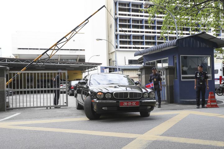 The car of ambassador of North Korea to Malaysia leaves the forensic department at the hospital in Kuala Lumpur.
