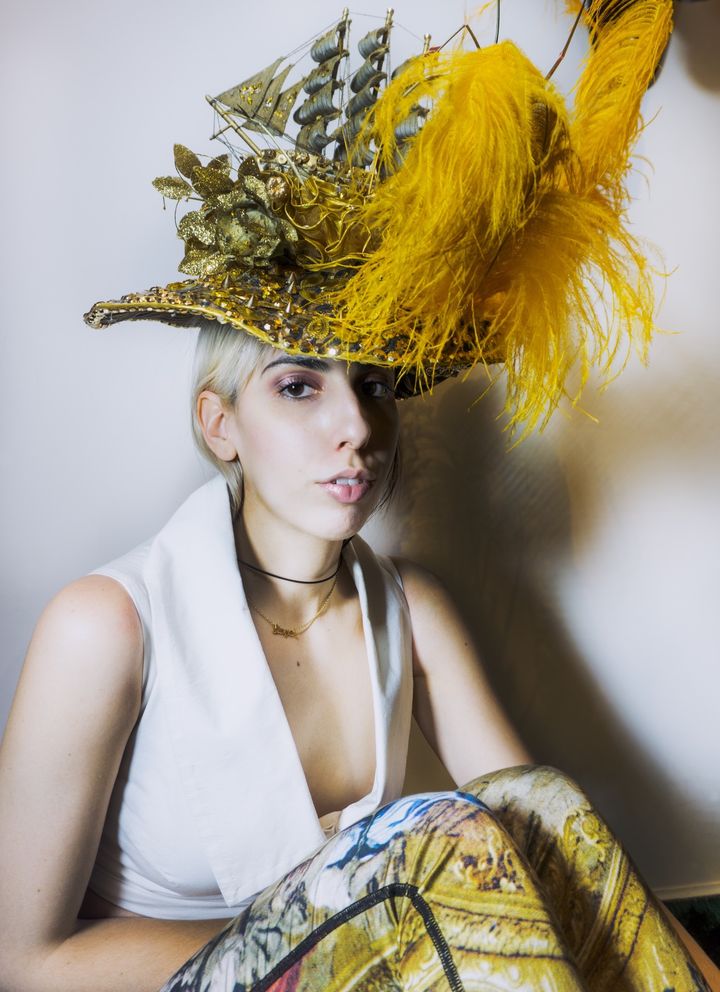 <p>Hat by Zoltan Toth Designs. Shirt by Doruntina Azemi</p>