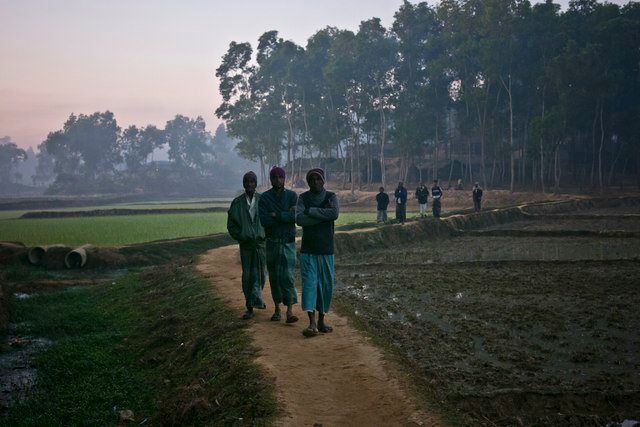 Walking down a road near the Kutapalong Rohingya refugee camp in Cox's Bazar.