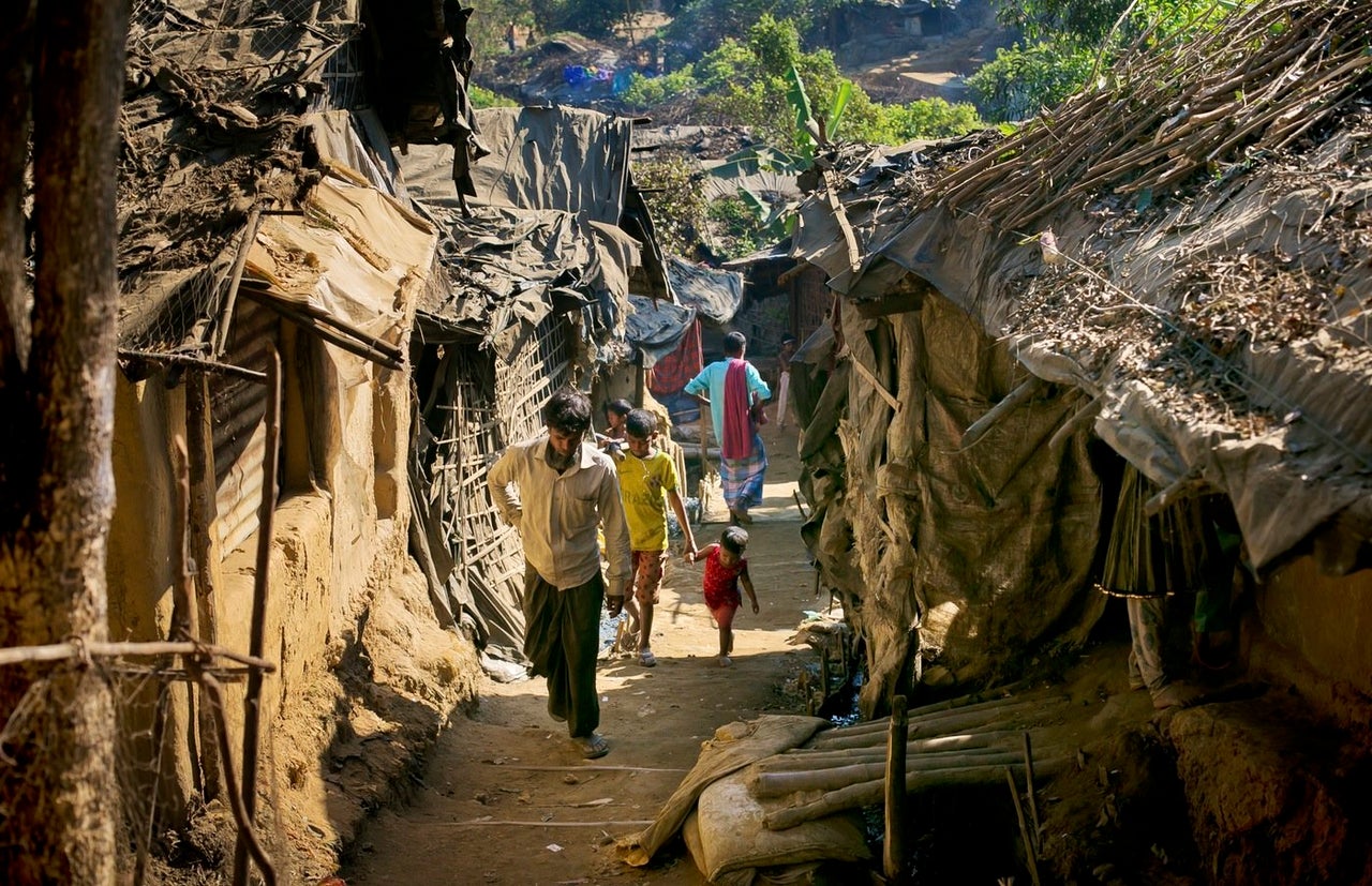 People walk through the overcrowded Kutapalong refugee camp.