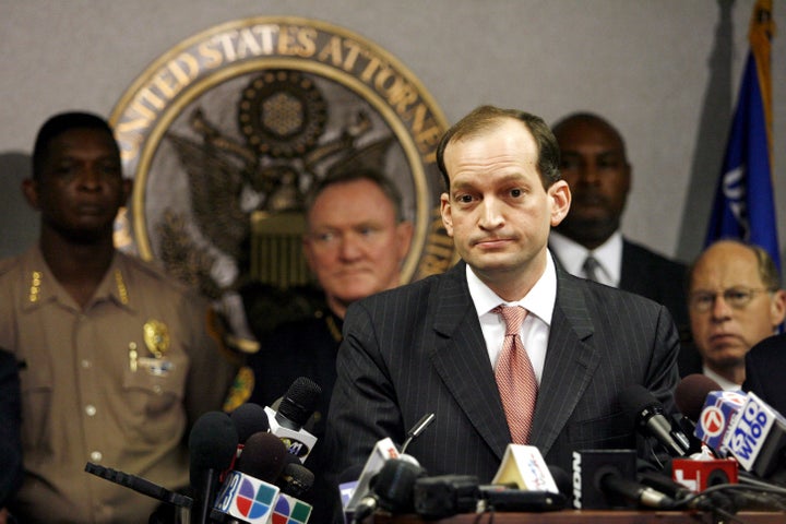 U.S. Attorney R. Alexander Acosta speaks to the media during a news conference on June 23, 2006, about the arrest of seven pe