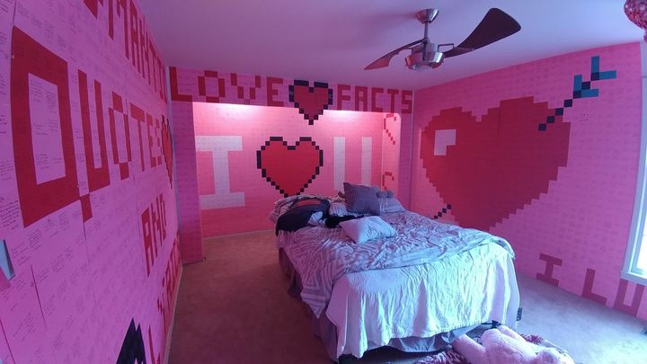 The couple's bedroom was covered with thousands and thousands of sticky notes.
