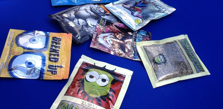 Packets of synthetic marijuana are put on display at a news conference held by New York state Senator Jeff Klein, August 12, 2015.