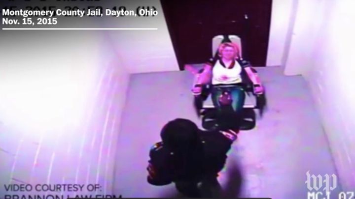 Back in 2015, a 25-year-old woman named Amber Swink was filmed being pepper-sprayed while in similar restraints.