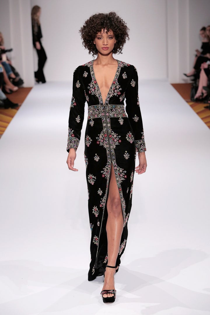 "Hill designs beautiful, if tame, prom dresses and gowns, so I wouldn’t be seeing a poor take on <a href="http://www.chron.com/life/style/fashion/article/Best-and-worst-of-NYFW-10929041.php#photo-12364106" target="_blank">Donald Trump’s 'MAGA' hat in sweater form</a>," -Andy Campbell