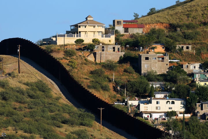 Buildings in Nogales, Mexico (right) are separated by a border fence from Nogales, Arizona, United States, October 9, 2016