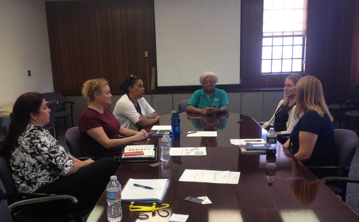 Six women veterans and veterans advocates network during a meeting of the Women Veterans Collaborative in Los Angeles. 