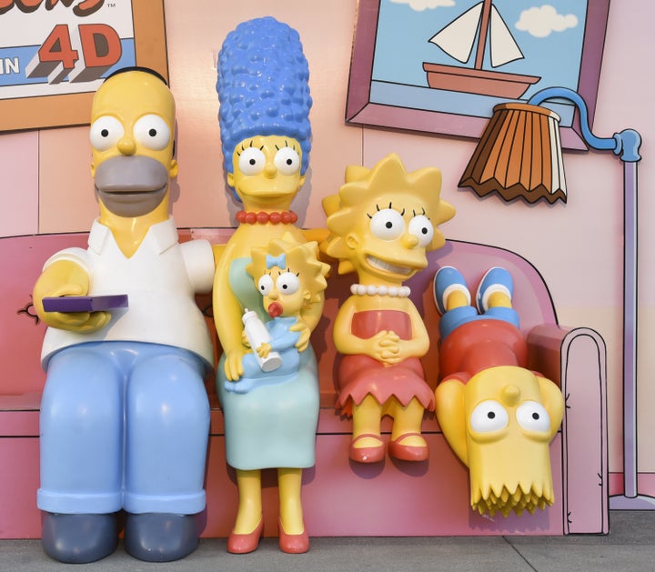 Life-size replicas of Homer, Marge, Maggie, Lisa and Bart Simpson appear at the Couch Gag Virtual Reality Experience in Los A