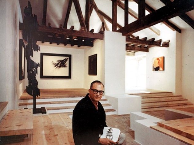 Fernando Zóbel at the Museum of Abstract Spanish Art in Cuenca, 1966. His painting Ornitóptero hangs behind him.