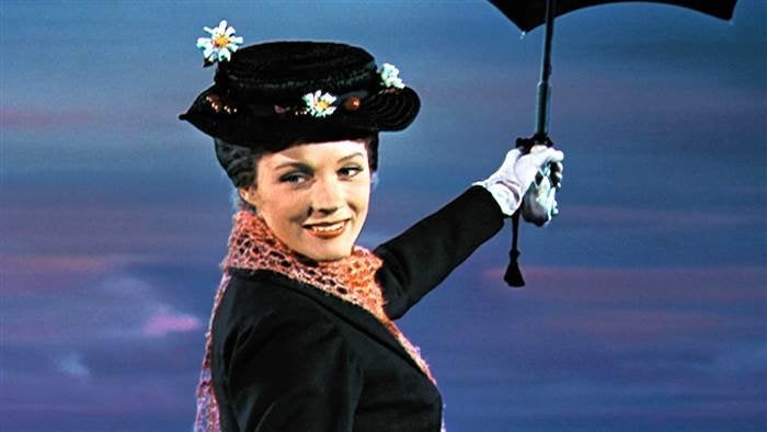 Julie Andrews holding her character's umbrella in