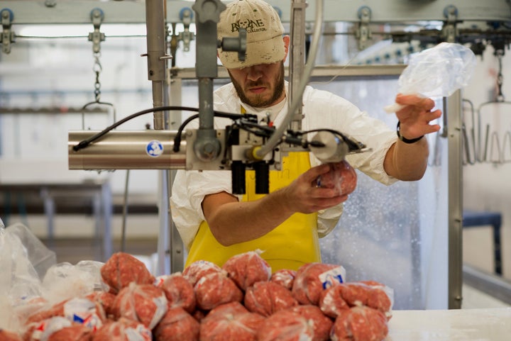 An employee packs ground turkey in Hamilton, New Jersey, on Oct. 21, 2013. Meatpackers are susceptible to injuries, but Republicans undid a workplace ergonomics rule that would have protected them using the Congressional Review Act.