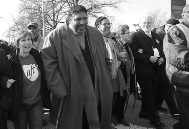 Weingarten with the Rev. Dr. William Barber at the Moral March on Raleigh, N.C., on Feb. 11.