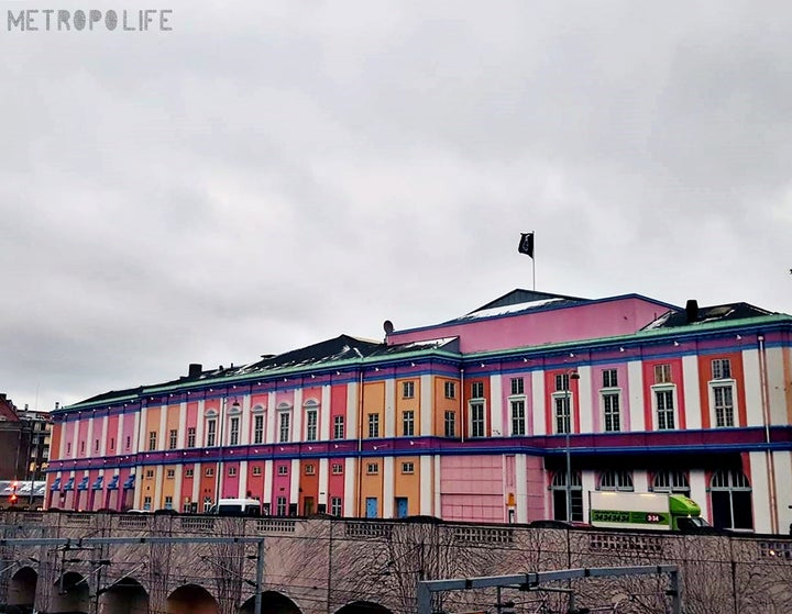 <p>The contrast of the grey sky and the iconic Palads cinema </p>