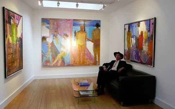 Sergy Mann in 2013 with some of his paintings at Cadogan Contemporary Gallery.The Telegraph