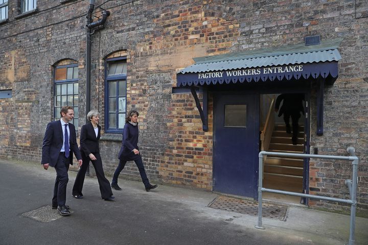 Theresa May visits a pottery factory in Stoke with by-election candidate Jack Brereton