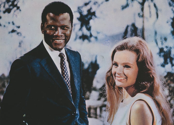 Actors Sidney Poitier and Katharine Houghton appear on the poster for "Guess Who's Coming To Dinner."