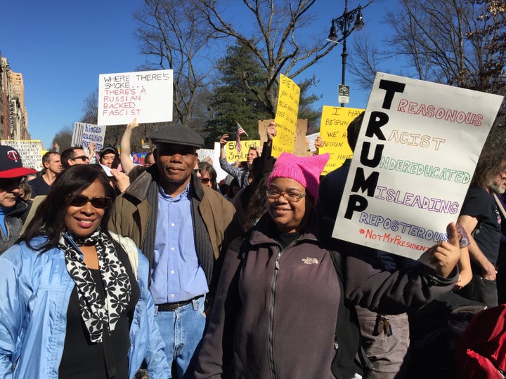 Richard Rumph, center, came to New York City's "Not My Presidents Day" from New Rochelle, New York.