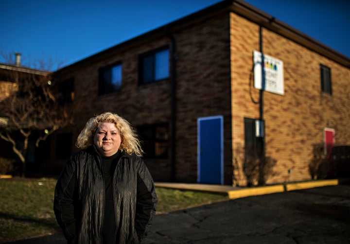 Rosie Palfy, Marine veteran, MST survivor, homelessness advocate, outside her old transitional housing provider, Front Steps, in Cleveland. The building is a converted Travelodge. Palfy has since exited homelessness successfully. Photo by Scott Shaw.