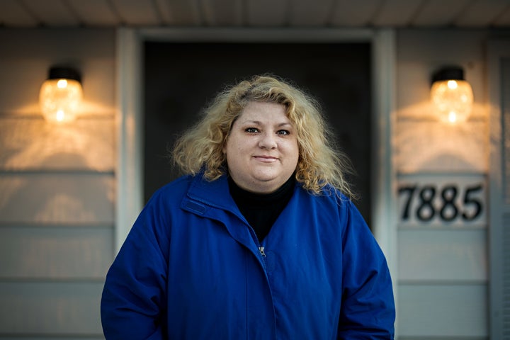 Rosie Palfy, Marine veteran, MST survivor, homelessness advocate, on her new “front steps” — of her own home outside Cleveland. Palfy was able to purchase her home once VA settled her disability compensation claim which had lingered in the system for eight and a half years, for injuries received (and recorded) during her service. Photo by Scott Shaw.